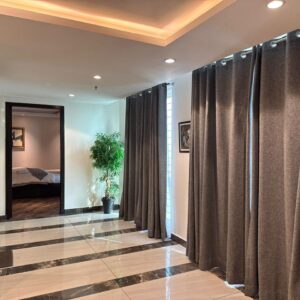 Rent Rover Lahore | Luxury short term Rentals in Lahore | pent-house-vacation-per-day-lahore | Modern hallway with curtains and plant
