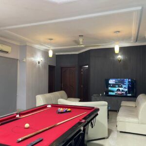 Rent Rover Lahore | Luxury short term Rentals in Lahore | 11000 PKR Per Day | Spacious Two Bed Apartment available in DHA Phase 8 Air Avenue. Features a beautiful living space with a pool table for entertainment. Perfect for short stays, offering comfort, security, and premium facilities — all for just 11000 per night
