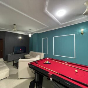 Rent Rover Lahore | Luxury short term Rentals in Lahore | 11000 PKR Per Day | Spacious Two Bed Apartment available in DHA Phase 8 Air Avenue. Features a beautiful living space with a pool table for entertainment. Perfect for short stays, offering comfort, security, and premium facilities — all for just 11000 per night