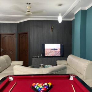 Rent Rover Lahore | Luxury short term Rentals in Lahore | 11000 PKR Per Day | Spacious Two Bed Apartment available in DHA Phase 8 Air Avenue. Features a beautiful living space with a pool table for entertainment. Perfect for short stays, offering comfort, security, and premium facilities — all for just 11000 per night